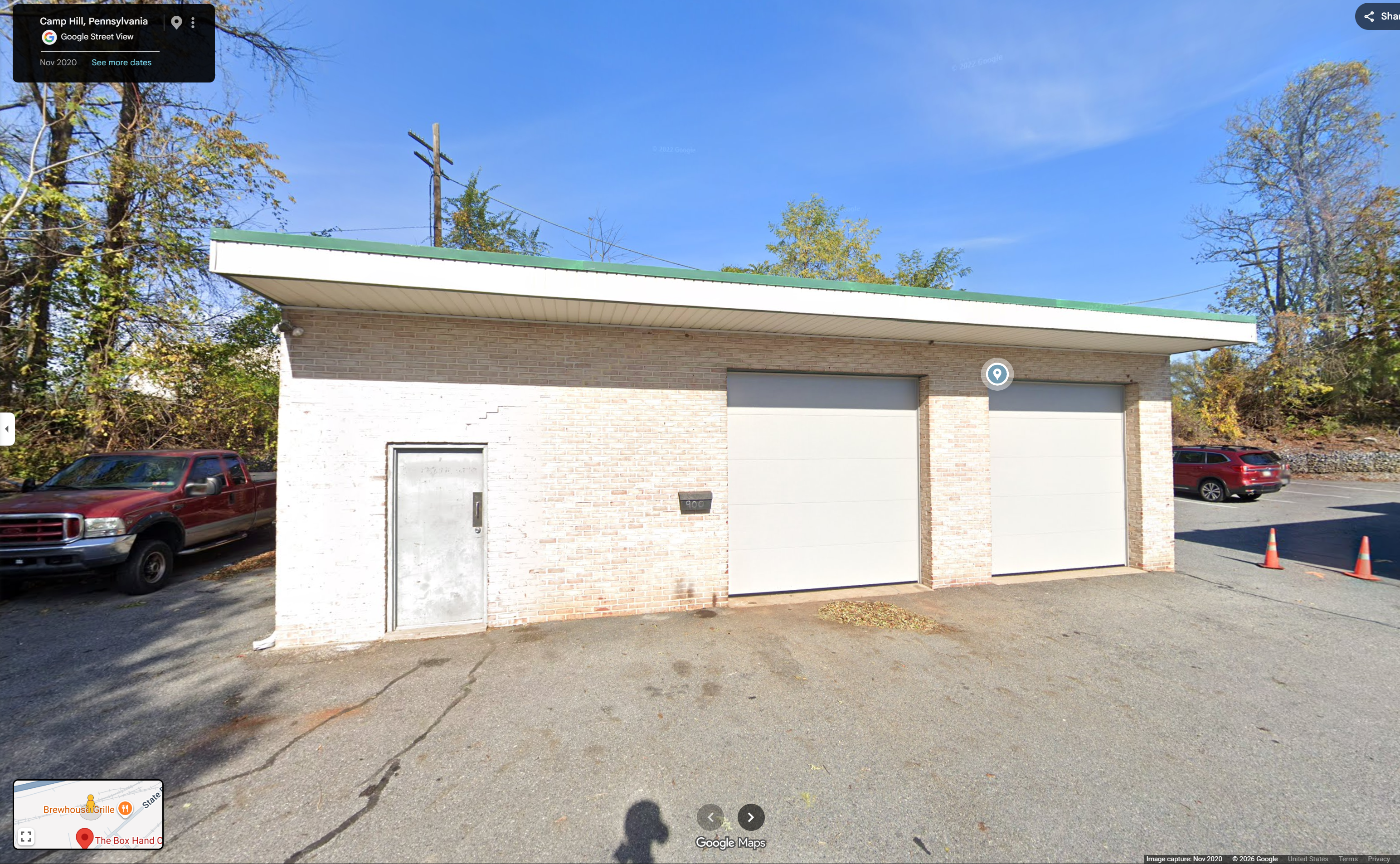 Current Coke's Auto two-bay shop exterior at 900 Kranzel Drive